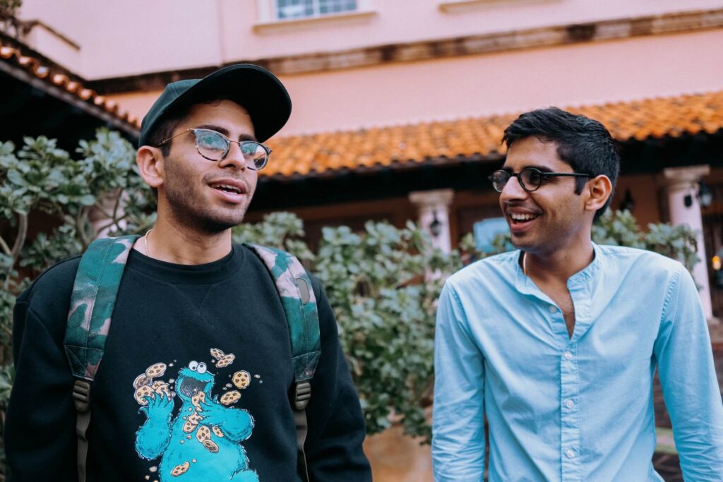 two men chatting and laughing