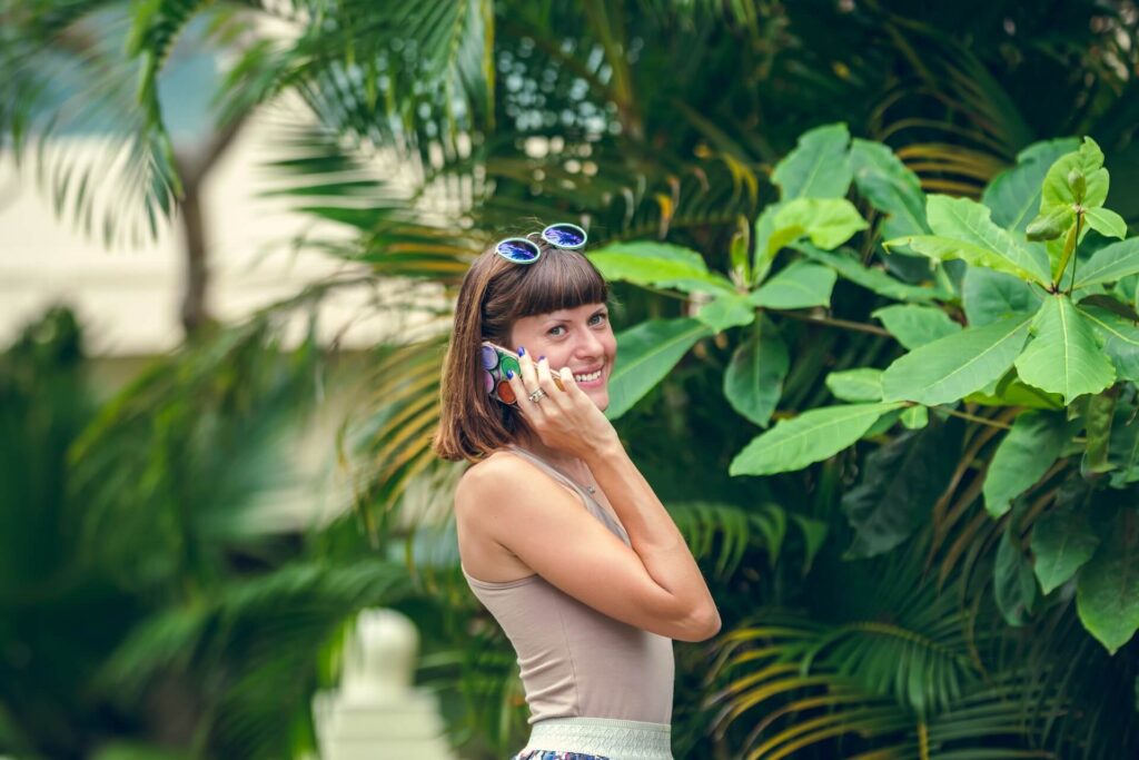 girl in sunglasses talking in spanish on the phone